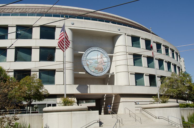 SanFrancisco100313-8892.jpg - City Hall Seal, viewed from McAllister at Van Ness. Hop-on Hop-off bus tour of San Francisco