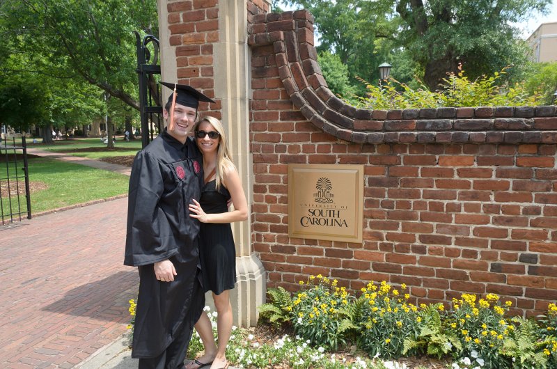 UofSCGraduation10May2013-6672.jpg - Coleman Michelle at Horseshoe entrance gate