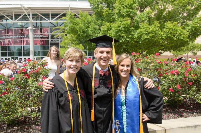 UofSCGraduation10May2013-6977.jpg - Kate Mike and Liane outside of Colonial Life Arena after graduation. Hanna in the background