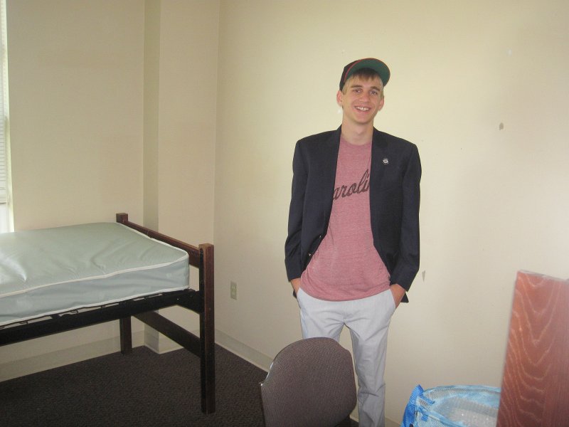 UofSCGraduation10May2013-5199.jpg - Mike checking out of his room in East Quad