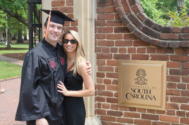UofSCGraduation10May2013-6673.jpg - Coleman Michelle at Horseshoe entrance gate