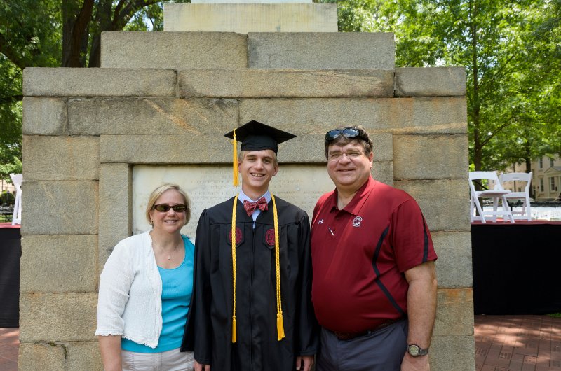 UofSCGraduation10May2013-6718.jpg - Cathie, Mike and Jack at Maxcy Monument