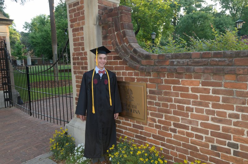 UofSCGraduation10May2013-6755.jpg - Mike at Horseshoe Entrance Gate