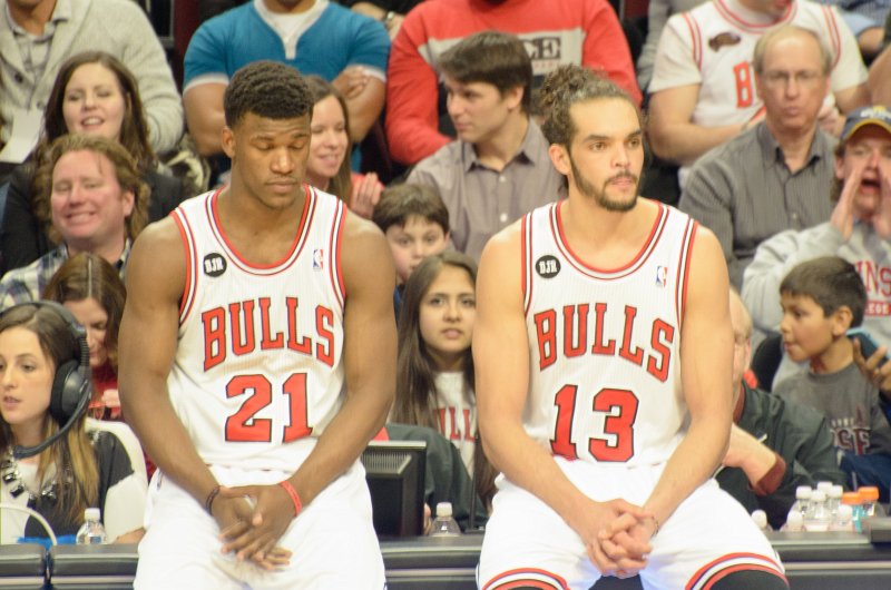 BullsVsPortland032814-0833-3.jpg - Jimmy Butler and Joakim Noah, waiting for timeout. Bulls vs Portland Trailblazers, United Center 3/28/14