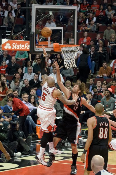 BullsVsPortland032814-0896-2.jpg - Carlos Boozer and Robin Lopez. Bulls vs Portland Trailblazers, United Center 3/28/14