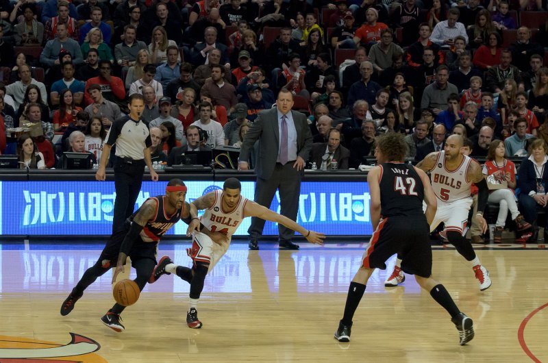 BullsVsPortland032814-0906-2.jpg - D.J. Augustin and Mo Williams. Bulls vs Portland Trailblazers, United Center 3/28/14