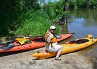 Cathie  Cathie says high from the Lois Landing takeout point in Millington. Kayaking the Fox River from Yorkville to Millington : 2014, Fox River, Kayaking, Millington, Yorkville