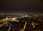 Paris120914-3129  Pont de l'Alma, further back and to the right is La Grande Roue de Paris ferris wheel next to the Place de la Concorde, view of Paris from the Tour Eiffel observation deck. Paris Day 1 : 2014, 7th arrondissement, Bridge, Cityscape, Night, Paris, Seine River, Tour Eiffel