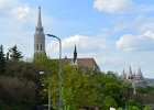 Budapest042715-2607  Mátyás-templom / Matthias Church, viewed from Hunyadi János út street near Matthias Church.   Bus tour of Budapest, including Matthias Church / Mátyás-templom and wine tasting at Domus Vinorum Borház : 2015, Budapest, Bus Tour