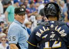 Umpire Angel Hernandez with Martin Maldonado. Cubs v Brewers 9/17/16  Umpire Angel Hernandez, #55 with catcher Martin Maldonado. Cubs vs Brewers at Wrigley Field, Cubs lose 11-3. : 2016, Baseball, Brewers, Cubs, MLB, Wrigley Field